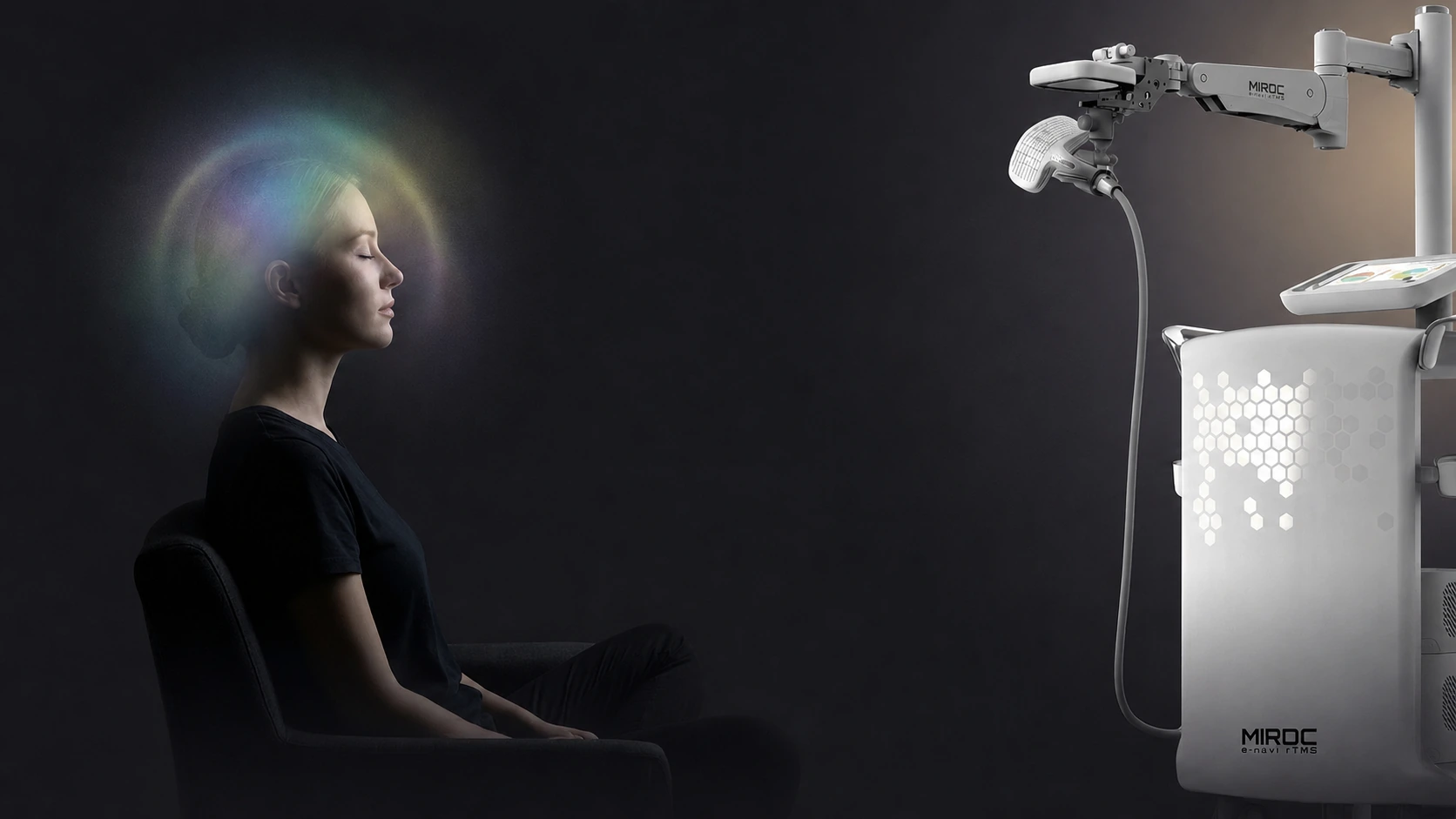 A patient seated beneath the e-navi rTMS coil arm, an aurora of colour around her head